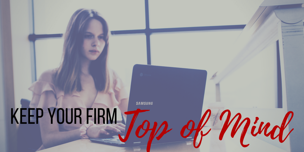 Person at laptop with "Top of Mind" text